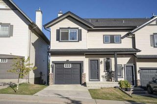 Main Photo: 60 Rockyspring Grove NW in Calgary: Rocky Ridge Semi Detached (Half Duplex) for sale : MLS®# A2136572