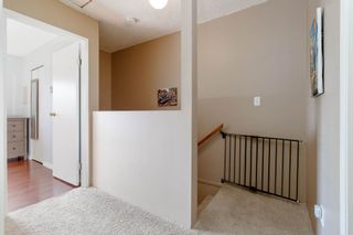 Photo 19: 905 BRITTON Drive in Port Moody: North Shore Pt Moody Townhouse for sale in "WOODSIDE VILLAGE" : MLS®# R2457346
