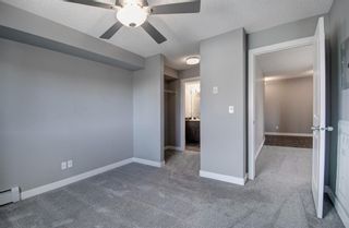 Photo 18: 9413 403 Mackenzie Way SW: Airdrie Apartment for sale : MLS®# A1201272