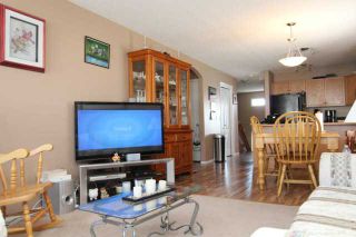 Photo 3: 543 STONEGATE Way NW: Airdrie Residential Attached for sale : MLS®# C3580927