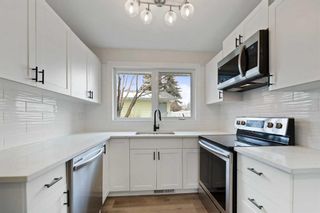 Photo 15: 411 Foritana Road SE in Calgary: Forest Heights Detached for sale : MLS®# A2128477
