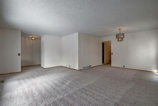 Photo 7: 762 Woodpark Road SW in Calgary: Woodlands Detached for sale : MLS®# A1048869