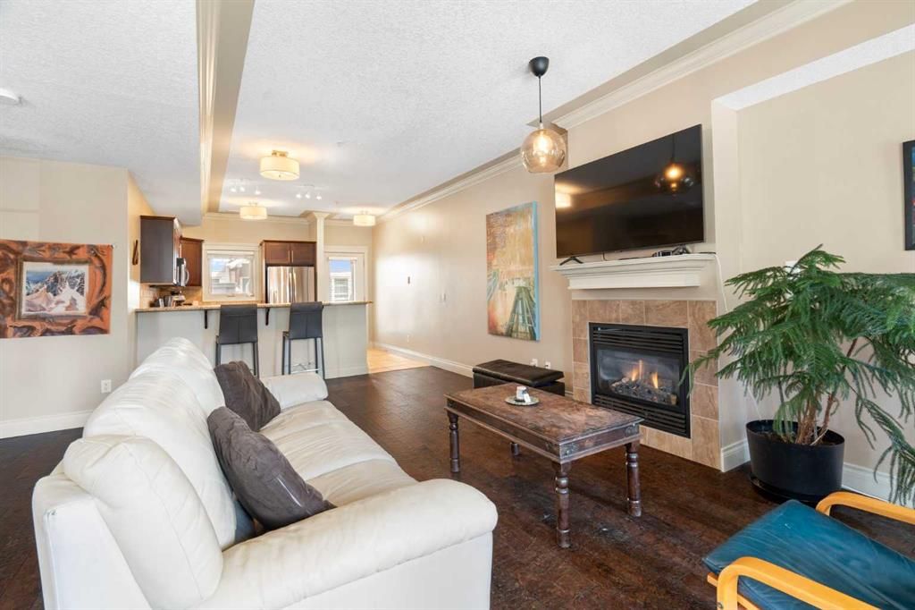 Main Photo: 107 1728 35 Avenue SW in Calgary: Altadore Row/Townhouse for sale : MLS®# A2125415