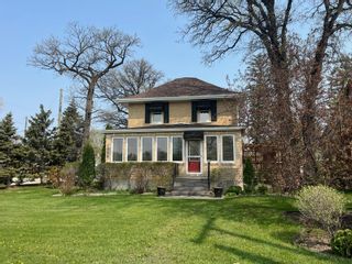 Photo 1: 1008 Crescent Road W in Portage la Prairie: House for sale : MLS®# 202306900