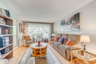 Photo 6: 108 Silvergrove Road NW in Calgary: Silver Springs Semi Detached for sale : MLS®# A1226861