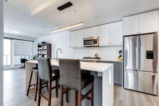 Photo 2: 602 327 9A Street NW in Calgary: Sunnyside Apartment for sale : MLS®# A2109898
