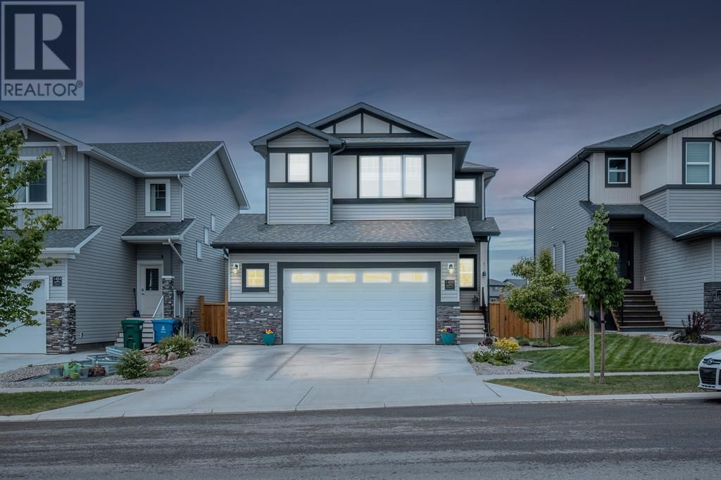 Main Photo: 1488 Coalbanks Boulevard W in Lethbridge: House for sale : MLS®# A2051126