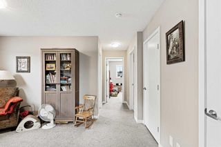 Photo 19: 332 Quigley Drive: Cochrane Semi Detached (Half Duplex) for sale : MLS®# A2126897