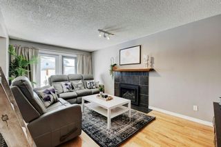 Photo 2: 44 Woodmont Rise SW in Calgary: Woodbine Detached for sale : MLS®# A2033461