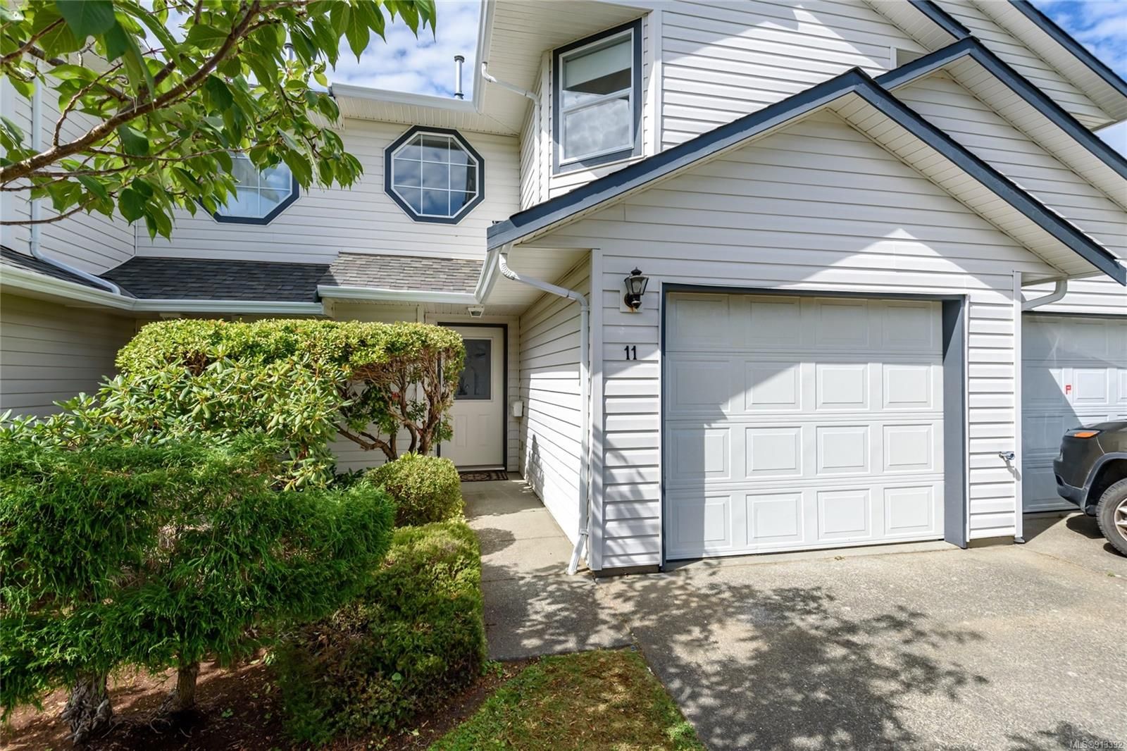 Main Photo: 11 2160 Hawk Dr in Courtenay: CV Courtenay East Row/Townhouse for sale (Comox Valley)  : MLS®# 913392