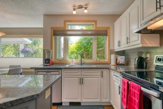 Photo 15: 119 Sunset Place SE in Calgary: Sundance Detached for sale : MLS®# A2051270