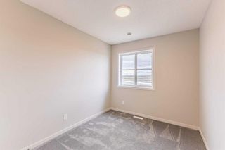 Photo 21: 212 Hotchkiss Drive in Calgary: C-385 Semi Detached (Half Duplex) for sale : MLS®# A2122668