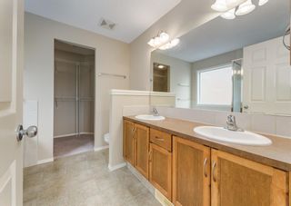 Photo 25: 148 Cougartown Close SW in Calgary: Cougar Ridge Detached for sale : MLS®# A2050763