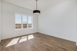 Photo 7: 7569 202 Avenue SE in Calgary: C-390 Semi Detached (Half Duplex) for sale : MLS®# A2045072