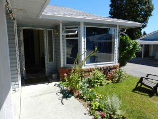 Photo 1: 7 824 NORTH Road in Gibsons: Gibsons & Area Townhouse for sale (Sunshine Coast)  : MLS®# R2216165