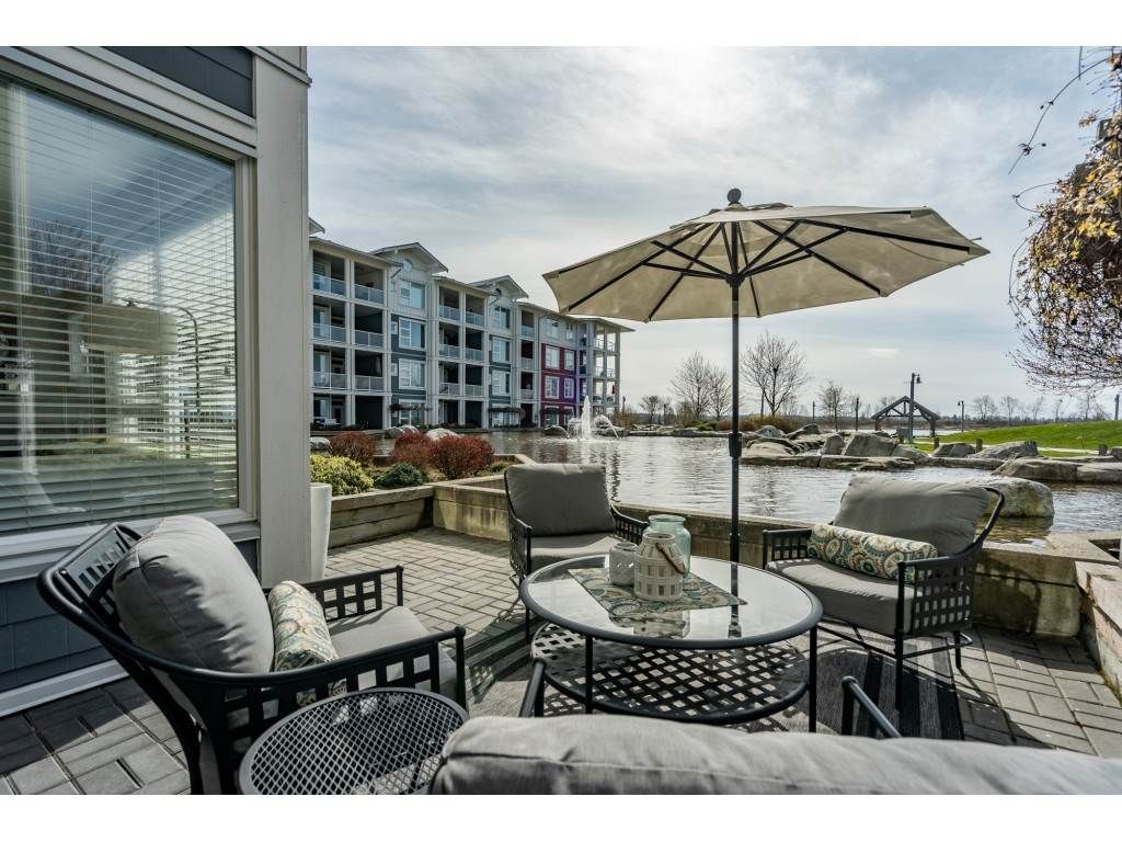 Main Photo: Waterfront Steveston Condo with Water Views and Private Lagoon in Fantastic Well Run Copper Sky