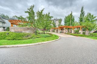 Photo 2: 66 Crystal Shores Cove: Okotoks Row/Townhouse for sale : MLS®# C4305435