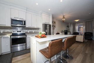 Photo 14: 404 Redstone Crescent NE in Calgary: Redstone Row/Townhouse for sale : MLS®# A1178308