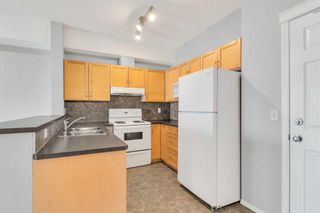 Photo 7: 3313 70 Panamount Drive NW in Calgary: Panorama Hills Apartment for sale : MLS®# A2070175