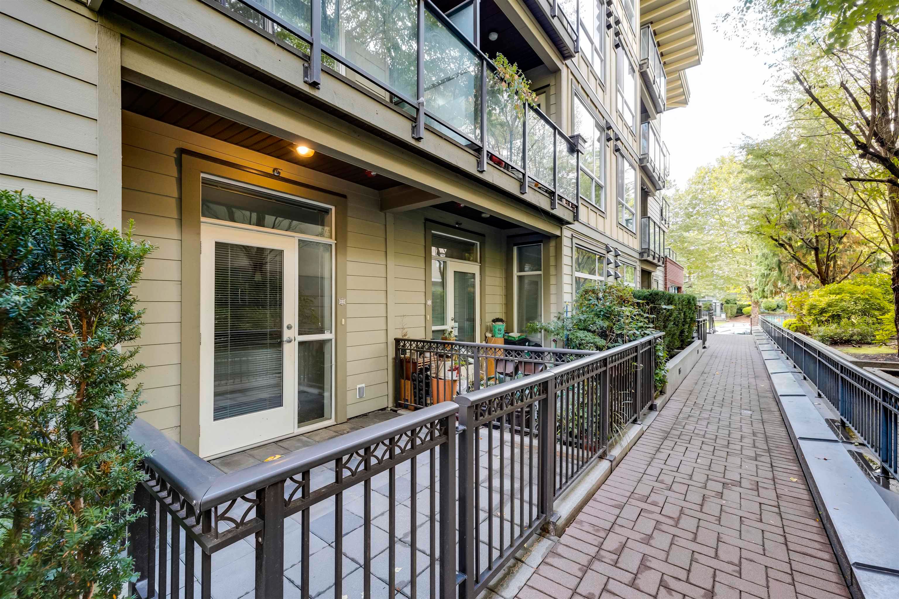 Main Photo: 103 2957 GLEN Drive in Coquitlam: North Coquitlam Townhouse for sale : MLS®# R2622570