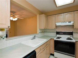 Photo 5: # 420 6707 SOUTHPOINT DR in Burnaby: South Slope Condo for sale in "Mission Woods" (Burnaby South)  : MLS®# V871813