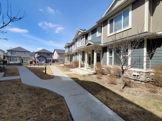 Photo 1: 106 Panatella Walk NW in Calgary: Panorama Hills Row/Townhouse for sale : MLS®# A1206869