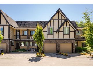 Photo 1: 109 6739 137 Street in Surrey: East Newton Townhouse for sale in "Highland Grands" : MLS®# R2605797