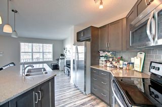 Photo 11: 172 Sunvalley Road: Cochrane Row/Townhouse for sale : MLS®# A1209421