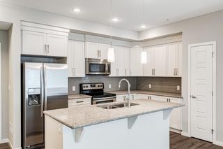 Photo 4: 303 6603 New Brighton Avenue SE in Calgary: New Brighton Apartment for sale : MLS®# A1165931