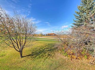 Photo 29: 102 Country Club Lane in Rural Rocky View County: Rural Rocky View MD Semi Detached (Half Duplex) for sale : MLS®# A2089048