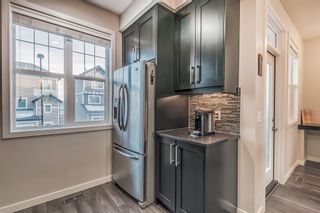 Photo 5: 33 Nolan Hill Boulevard NW in Calgary: Nolan Hill Row/Townhouse for sale : MLS®# A2036333