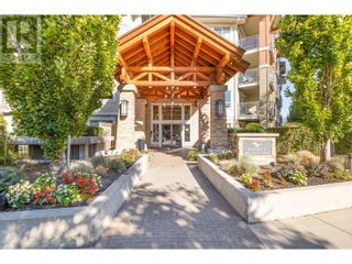 Photo 1: 1093 Sunset Drive Unit# 402 in Kelowna: House for sale : MLS®# 10304332