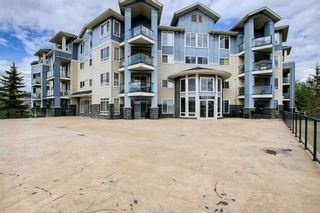 Photo 1: 302 120 Country Village Circle NE in Calgary: Country Hills Village Apartment for sale : MLS®# A1214109