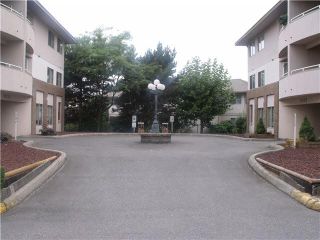 Photo 2: 204 19128 FORD Road in Pitt Meadows: Central Meadows Condo for sale in "BEACON SQUARE" : MLS®# V1095908