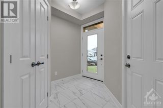 Photo 2: 310 WHITHAM CRESCENT in Kemptville: House for sale : MLS®# 1369720