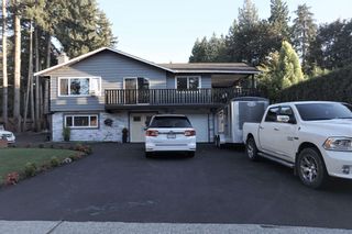 Photo 1: 19994 39A Avenue in Langley: Brookswood Langley House for sale : MLS®# R2596970