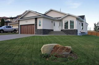 Photo 1: 103 Signal Hill Court SW in Calgary: Signal Hill Detached for sale : MLS®# A2030540