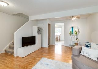 Photo 5: 535 Queenston Gardens SE in Calgary: Queensland Row/Townhouse for sale : MLS®# A1231832
