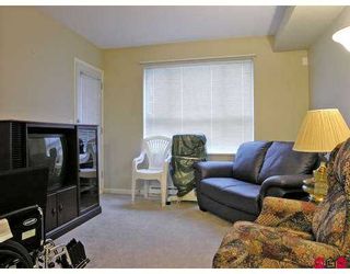 Photo 4: 105 5465 203RD Street in Langley: Langley City Condo  in "Station 54" : MLS®# F2626460