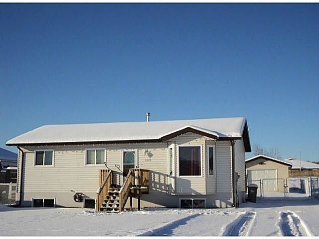 Main Photo: 5013 46 Street in Fort Nelson: Fort Nelson -Town House for sale in "MIDTOWN" : MLS®# R2563045