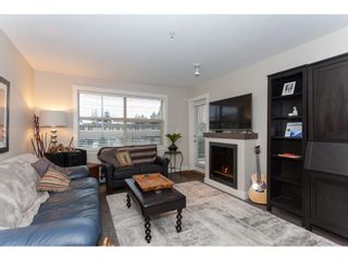 Photo 4: 202 19936 56 Avenue in Langley: Langley City Condo for sale in "BEARING POINTE" : MLS®# R2240895