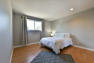 Photo 15: 1301 829 Coach Bluff Crescent in Calgary: Coach Hill Row/Townhouse for sale : MLS®# A1094909