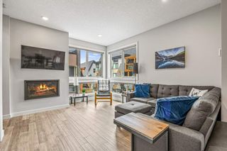 Photo 4: 704 102 Stewart Creek Rise: Canmore Row/Townhouse for sale : MLS®# A1250551