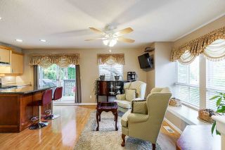 Photo 2: 64 16388 85 Avenue in Surrey: Fleetwood Tynehead Townhouse for sale in "CAMELOT VILLAGE" : MLS®# R2486322