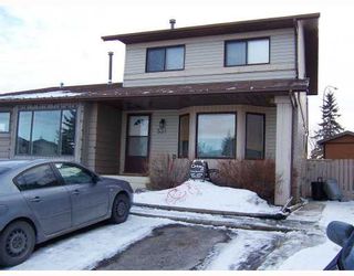 Photo 1: 531 SUMMERWOOD Place SE: Airdrie Residential Attached for sale : MLS®# C3366460