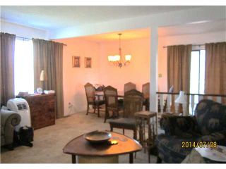 Photo 7: 1510 COMO LAKE AV in Coquitlam: Central Coquitlam House for sale : MLS®# V1074697