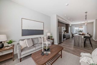 Photo 18: 408 Shawnee Square SW in Calgary: Shawnee Slopes Row/Townhouse for sale : MLS®# A2117182