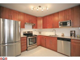 Photo 5: 401 5759 GLOVER Road in Langley: Langley City Condo for sale in "College Court" : MLS®# F1207206