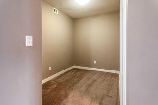 Photo 17: 211 403 Mackenzie Way SW: Airdrie Apartment for sale : MLS®# A2125740