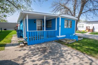 Photo 1: 80 Springwood Drive in Winnipeg: South Glen Residential for sale (2F)  : MLS®# 202313822